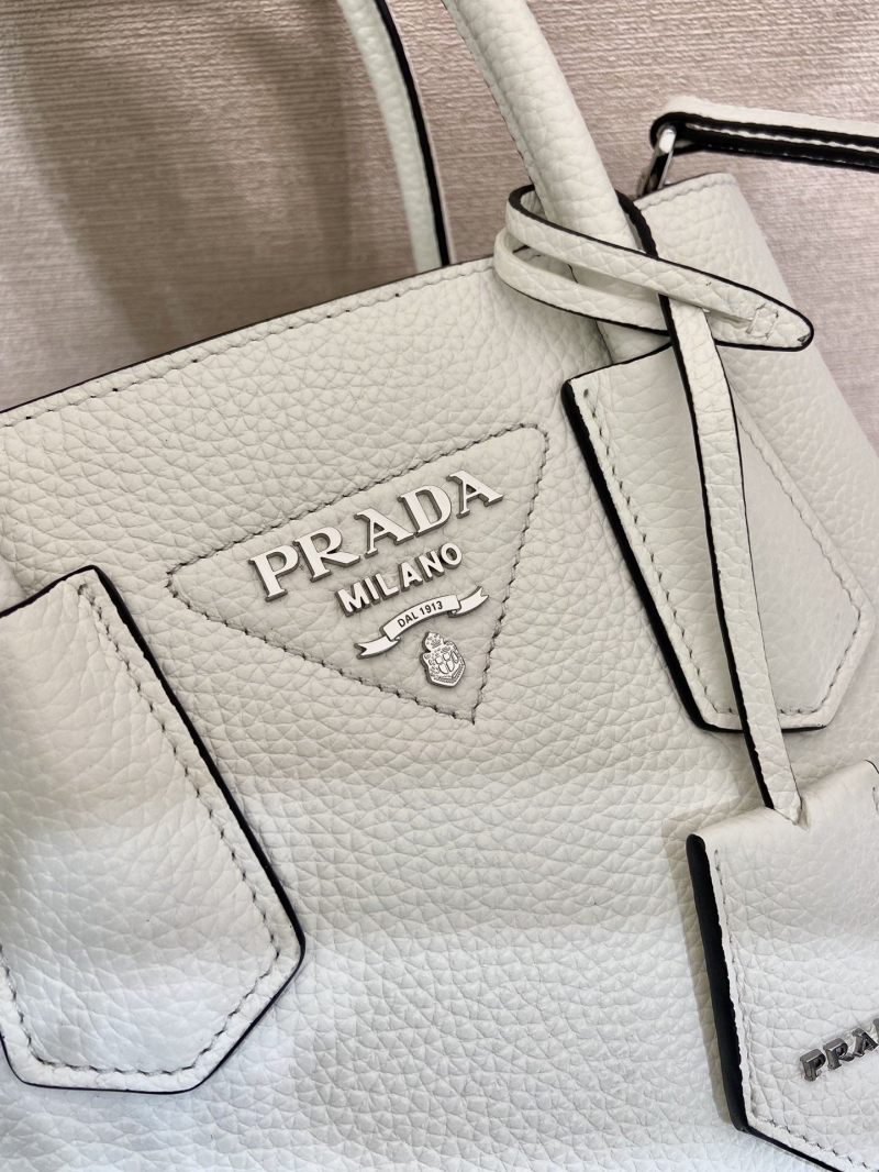 Pra*a top handle bags